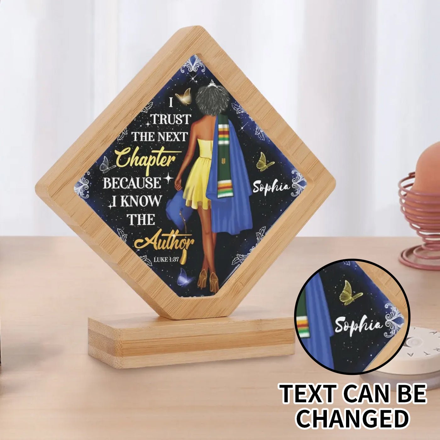 Personalized graduation plaque with African American woman in cap and gown, quote “I trust the next chapter because I know the Author,” custom name option.