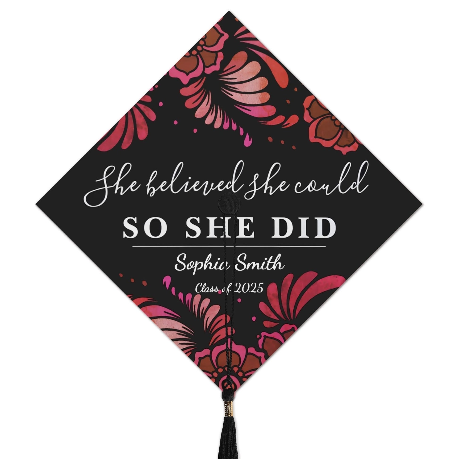 Custom grad cap topper with quote ‘She believed she could so she did’ – personalized with graduate’s name and year.