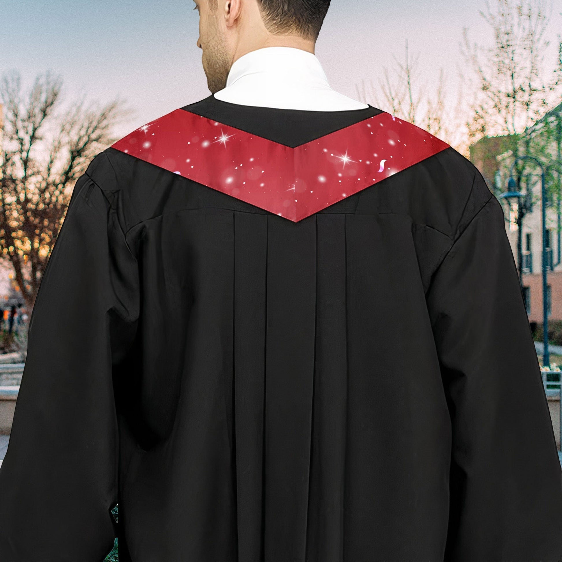 Graduation stole draped over gown with red fireworks pattern and shiny finish