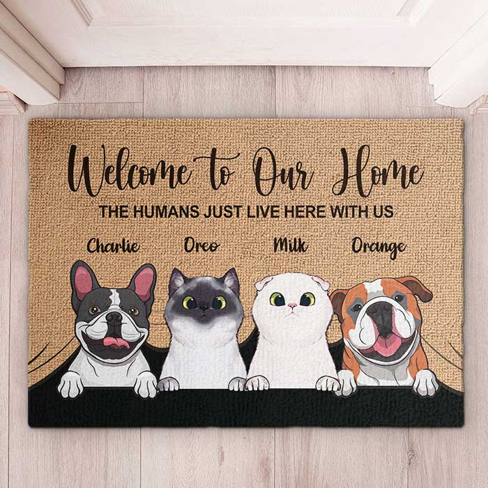 High-quality custom pet welcome mat with detailed pet illustrations and personalized text