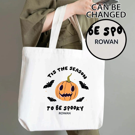 Personalized Halloween tote bag with pumpkin and bats design, featuring “Tis the Season to Be Spooky” text and custom name, eco-friendly reusable bag for trick-or-treating.