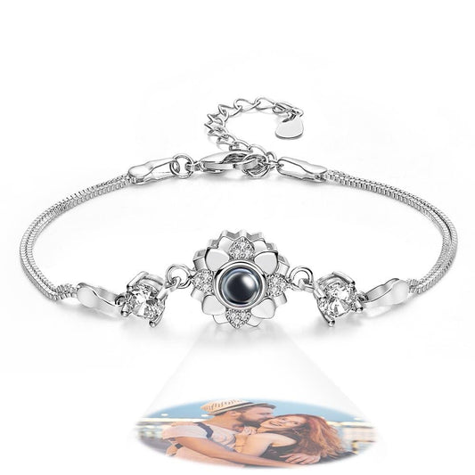 Personalized flower photo projection bracelet in silver with hidden custom picture inside charm, elegant keepsake jewelry gift for women or couples.