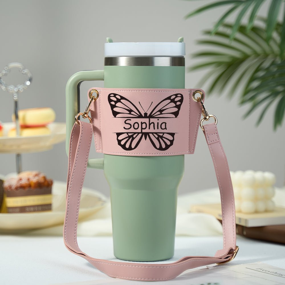 Leather tumbler sleeve with engraved butterfly design and custom name personalization