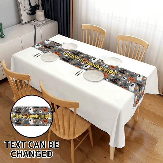 Custom Halloween table runner with ghosts, pumpkins, and spiderweb design, featuring editable text, displayed on white dining table for spooky seasonal décor.