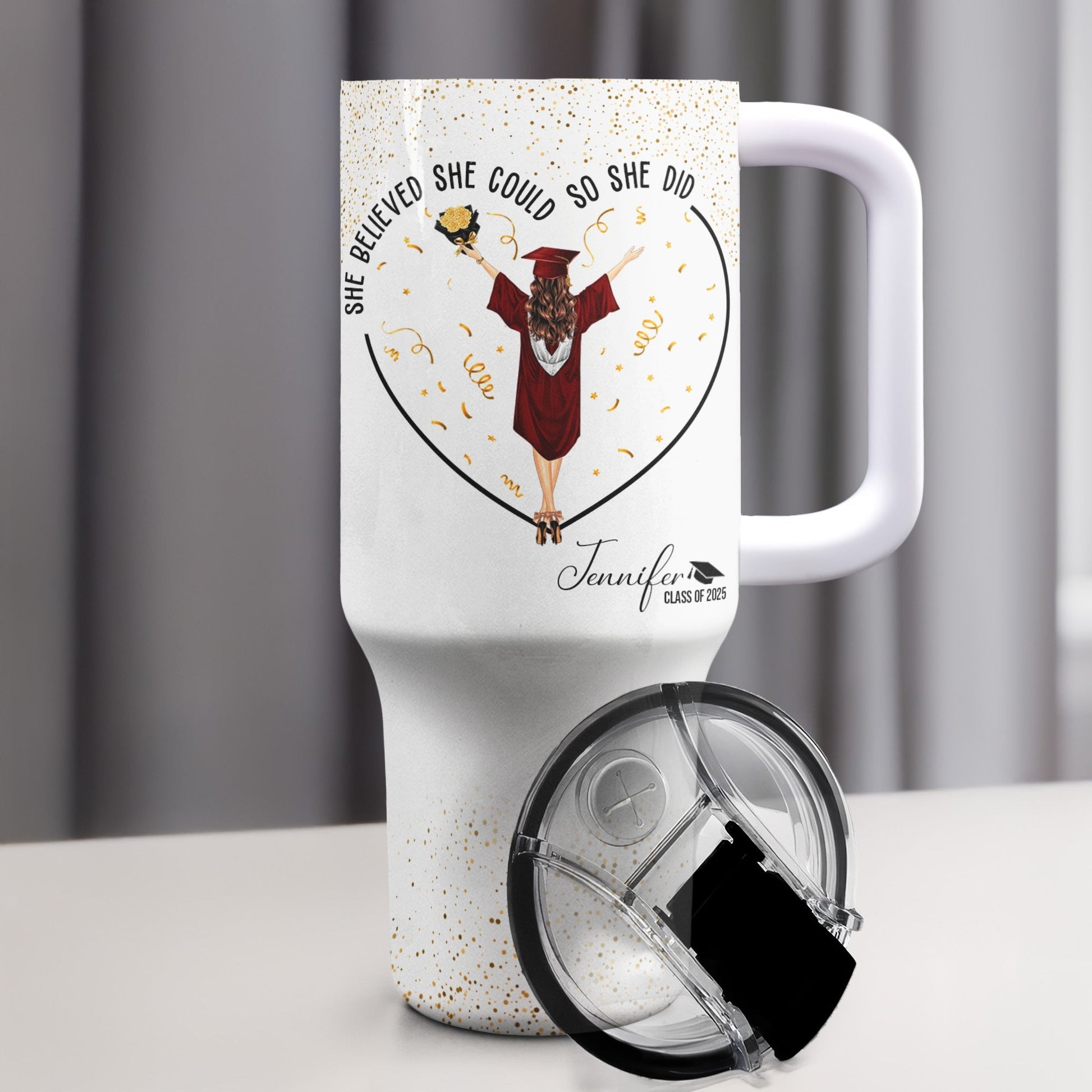 Personalized graduation tumbler with quote ‘She believed she could so she did’ and custom graduate name