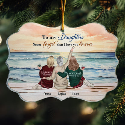 Personalized family ornament glowing on Christmas tree, unique custom gift for daughters from mom.